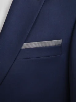 Pochette de costume en pure soie finement côtelée gris réversible bleu dur